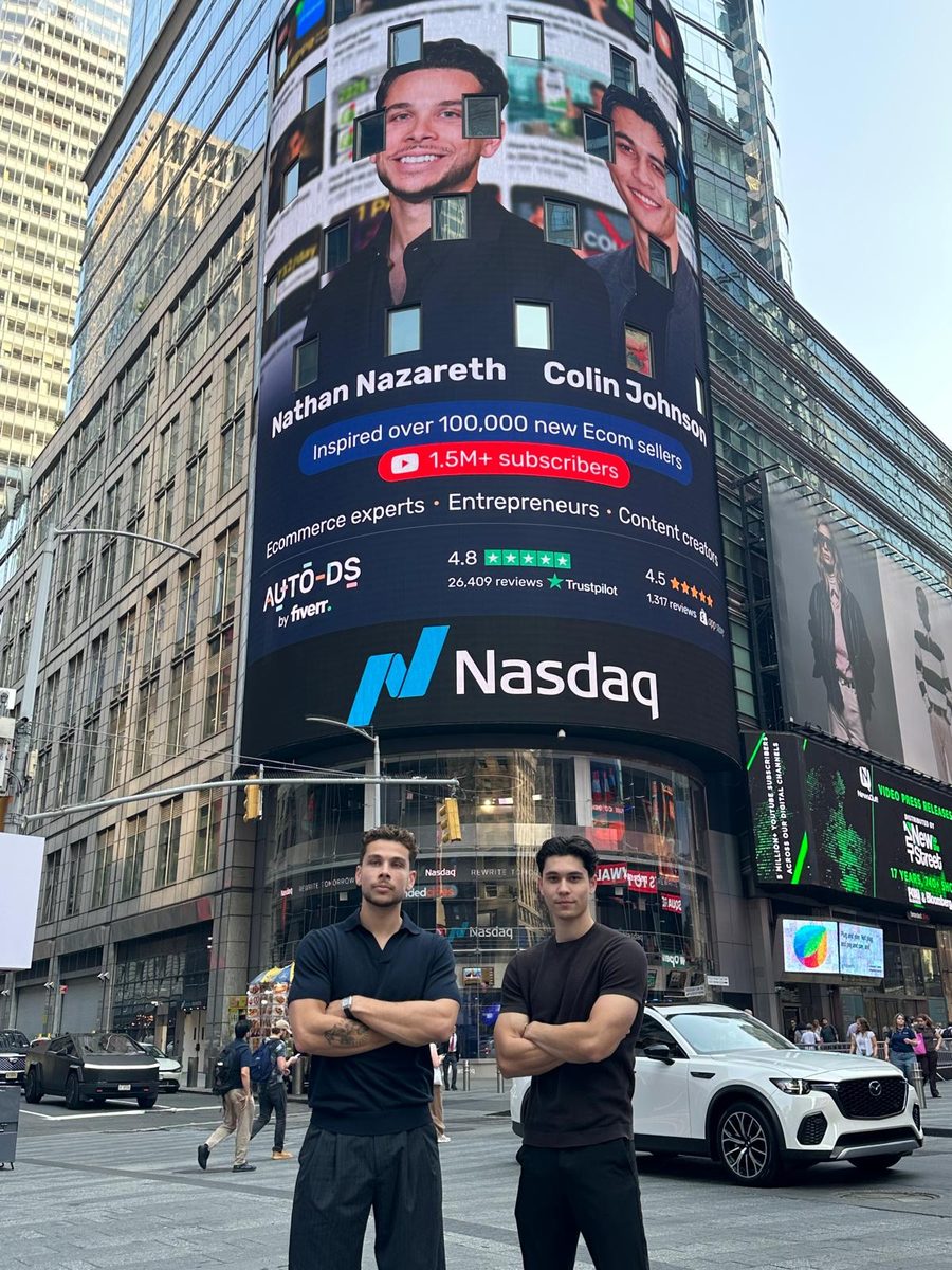 Nathan Nazareth and Colin Johnson under their Nasdaq billboard in Times Square
